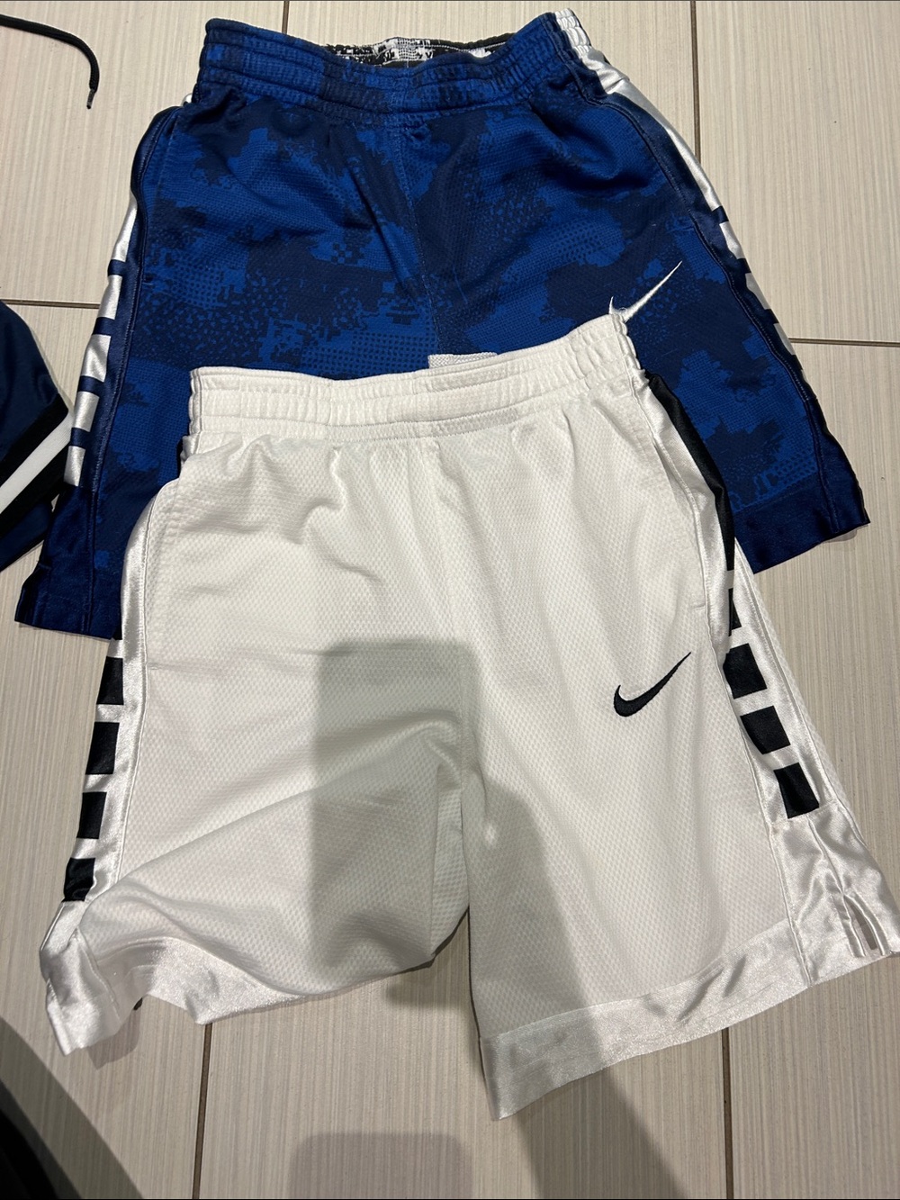 Nike White Athletic Shorts with Black Accents & Blue Pair Shown 20 for both